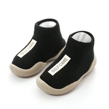 Обувь для малышей, первые туфли, ходунки, Новые детские ходунки Унисекс, обувь на мягкой резиновой подошве, черные вязаные пинетки, противоскользящие
